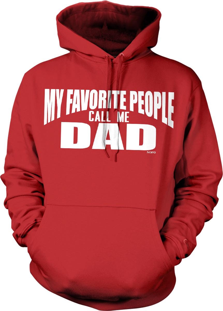 A red hoodie with white text that says "MY FAVORITE PEOPLE CALL ME DAD" printed on it.
