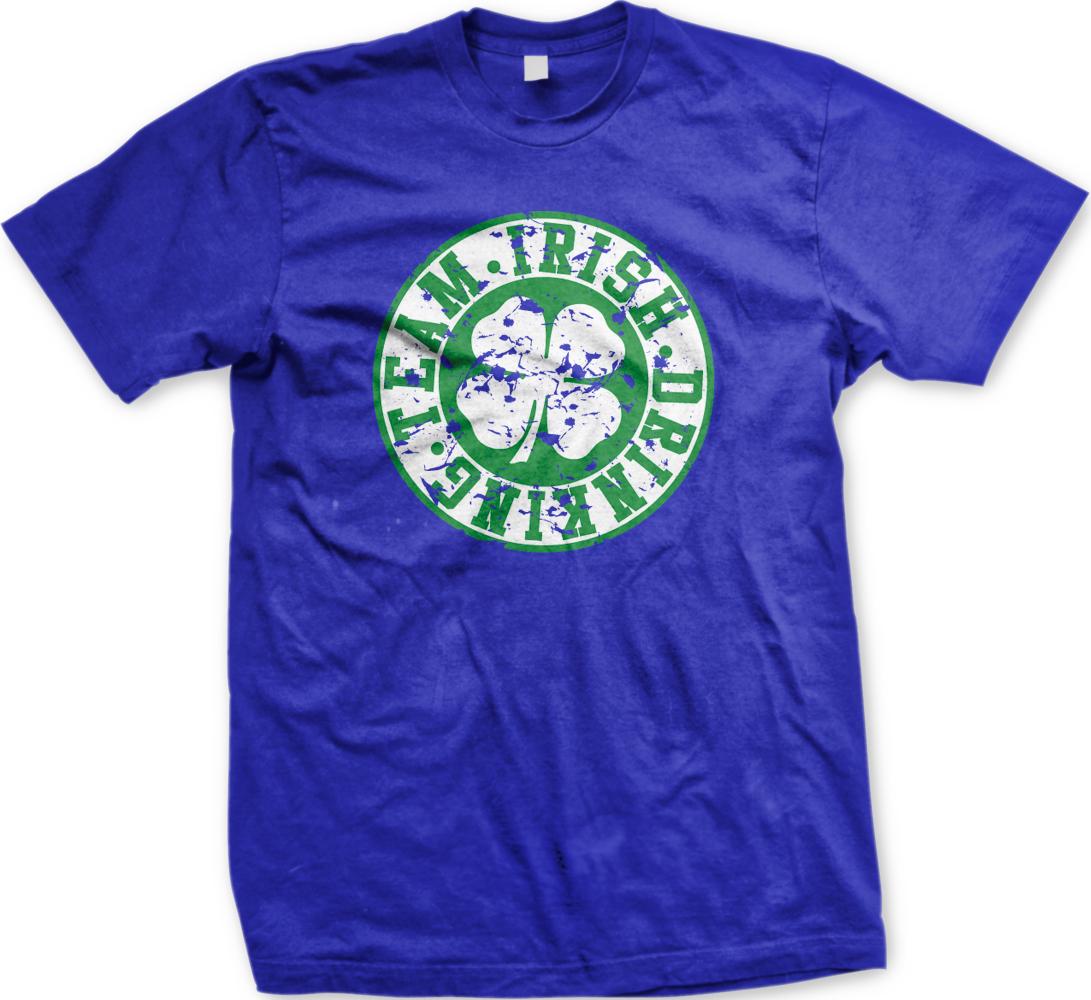 A blue t-shirt with a graphic design featuring a white and green clover flower and the text "TEAM. IRISH. DRINK. DANCE."