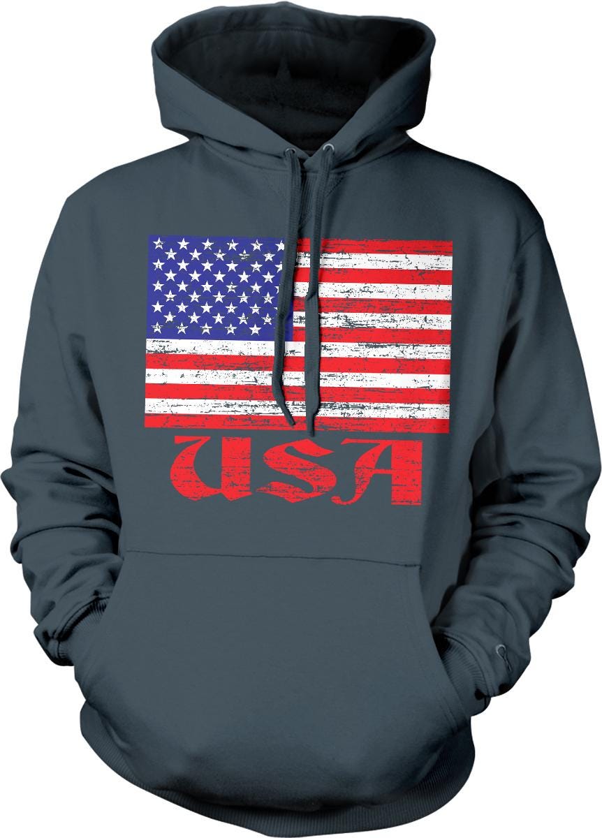 A gray hoodie with a graphic design featuring the American flag and the word "USA" printed on it.