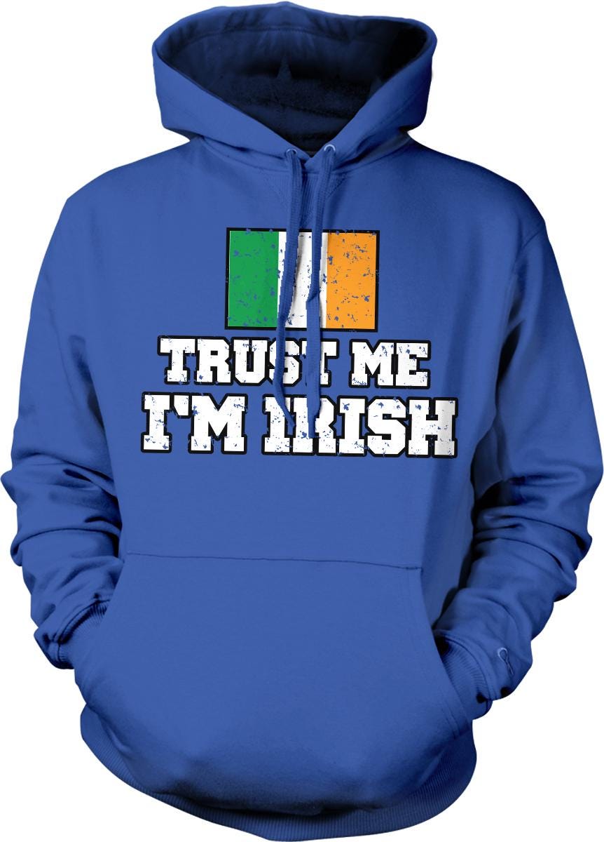 A blue hoodie with the text "TRUST ME I'M IRISH" printed on it, along with the Irish flag.