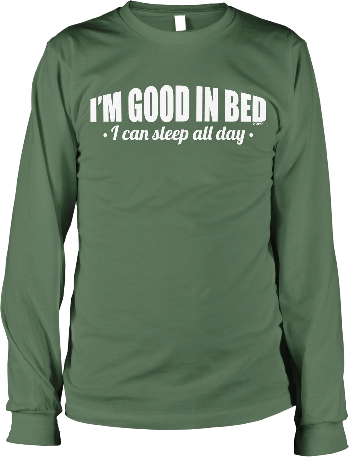 A green long-sleeved t-shirt with the text "I'M GOOD IN BED - I can sleep all day" printed on it.