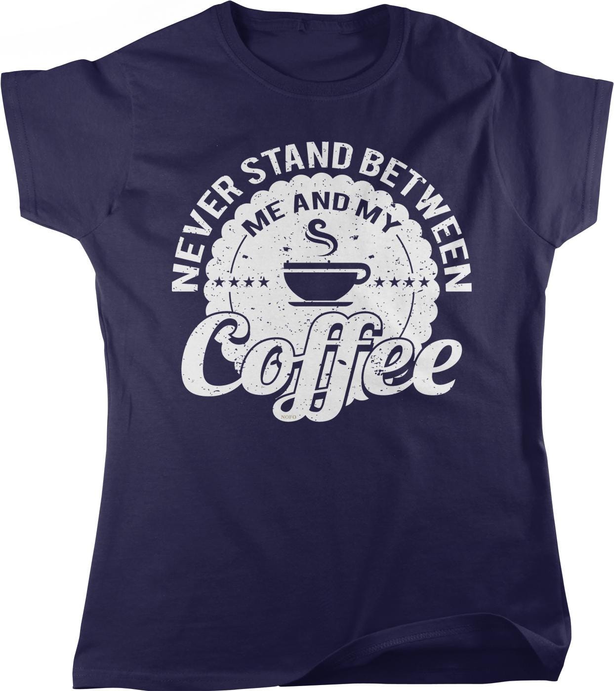 A navy blue t-shirt with a graphic design that says "Never stand between me and my coffee".
