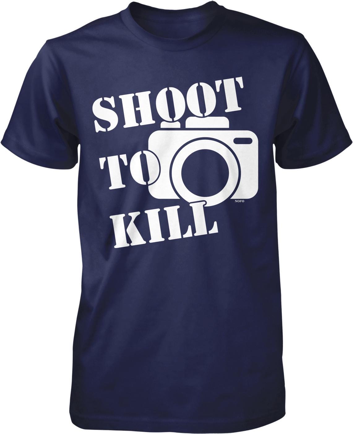 A navy blue t-shirt with the text "SHOOT TO KILL" printed on it, along with a graphic of a camera.