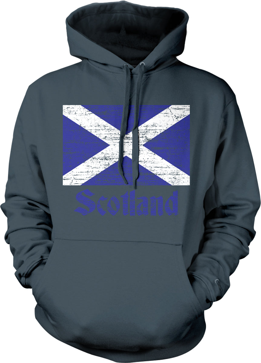 A grey hoodie with a graphic of the Scottish flag and the word "Scottland" printed on it.