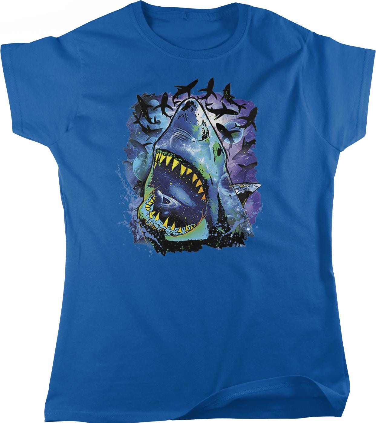 A blue t-shirt with a graphic design depicting a shark with its mouth open, surrounded by a flock of birds.