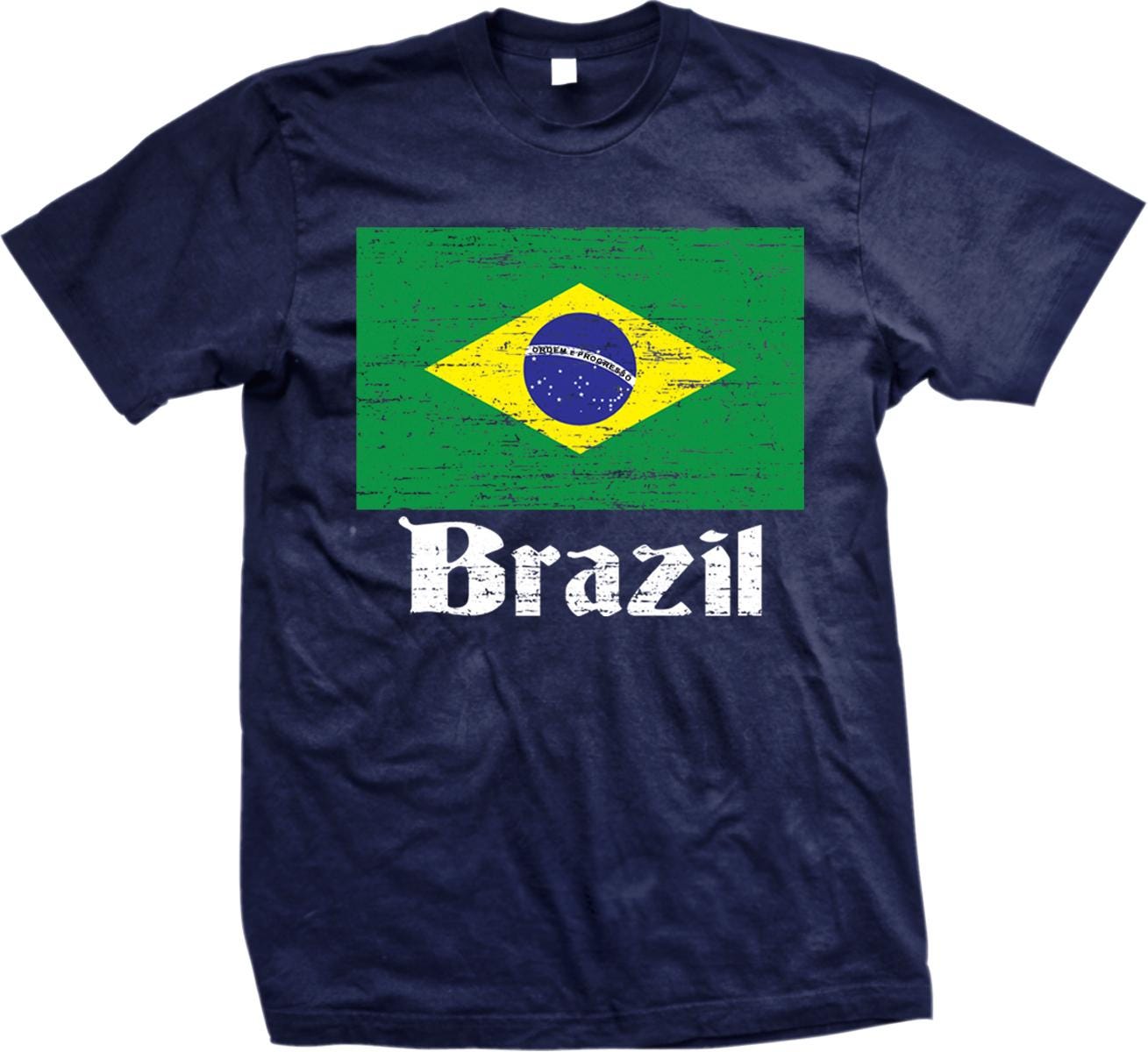 A navy blue t-shirt with a graphic of the Brazilian flag and the word "Brazil" printed on it.