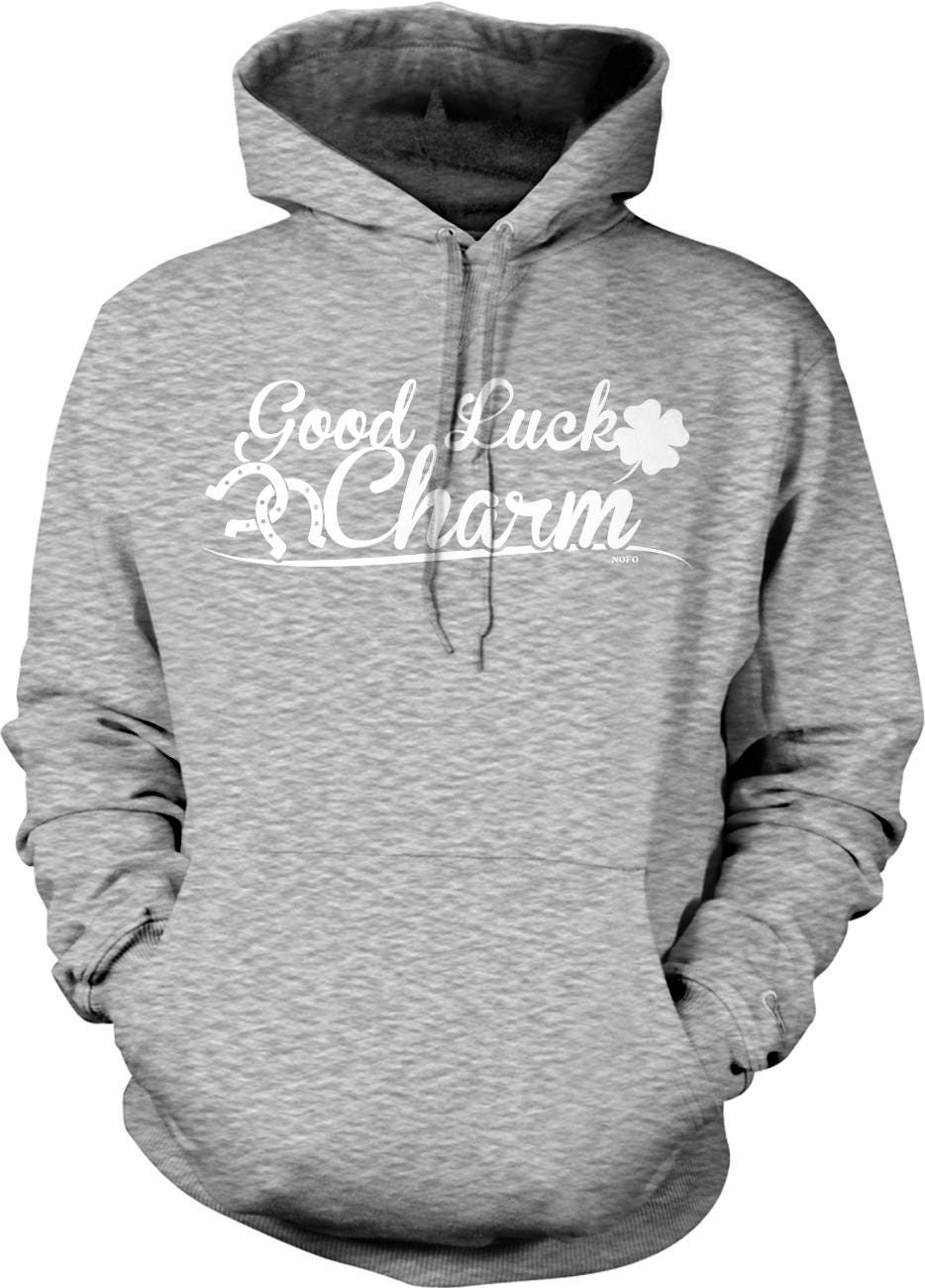 A gray hooded sweatshirt with the text "Good Luck Charm" printed on it.