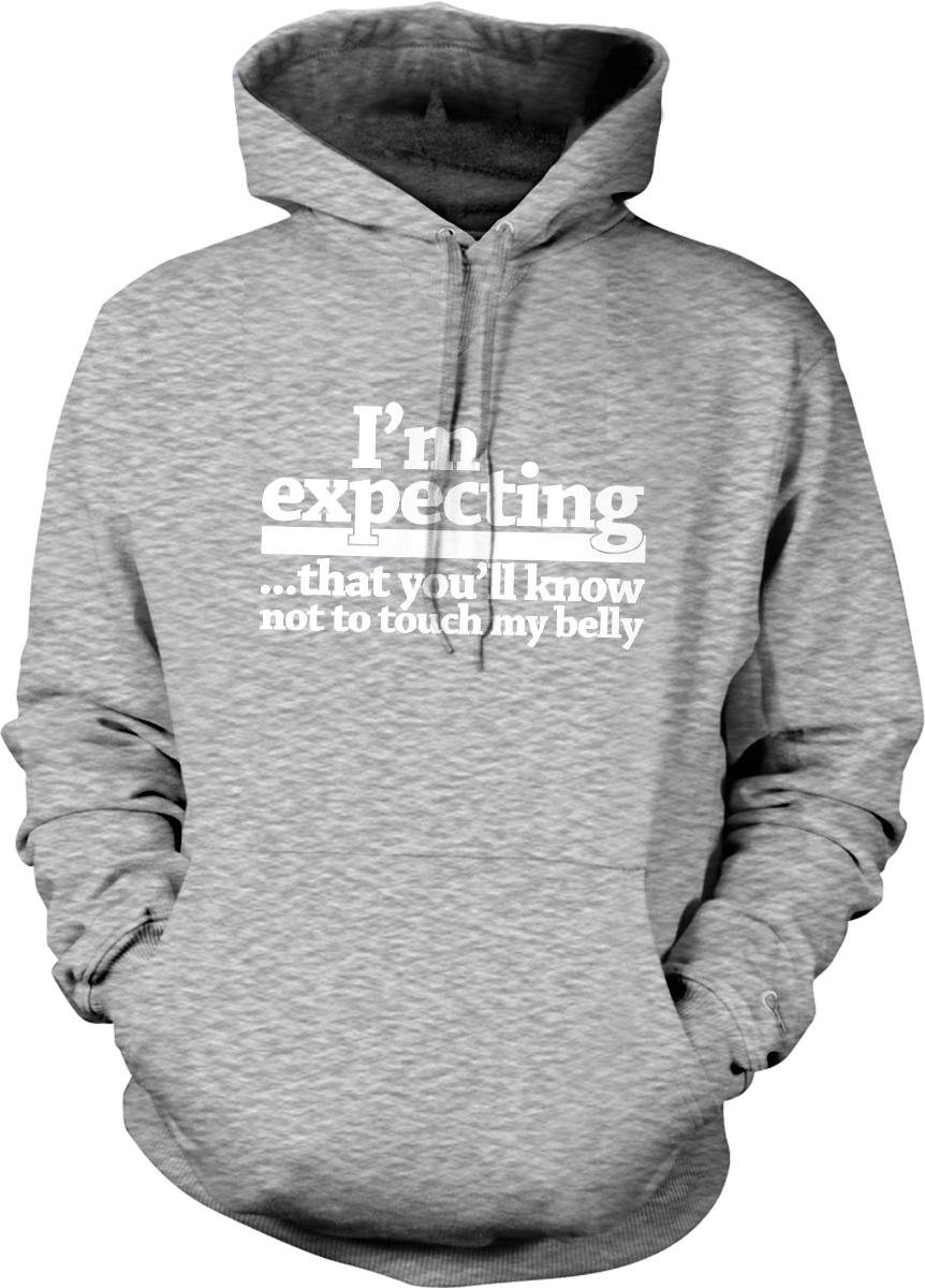 A gray hoodie with white text that reads "I'm expecting... that you'll know not to touch my belly".