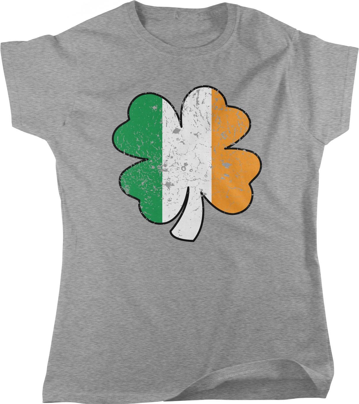 A grey t-shirt with a graphic design of a four-leaf clover, which is a symbol associated with Ireland.