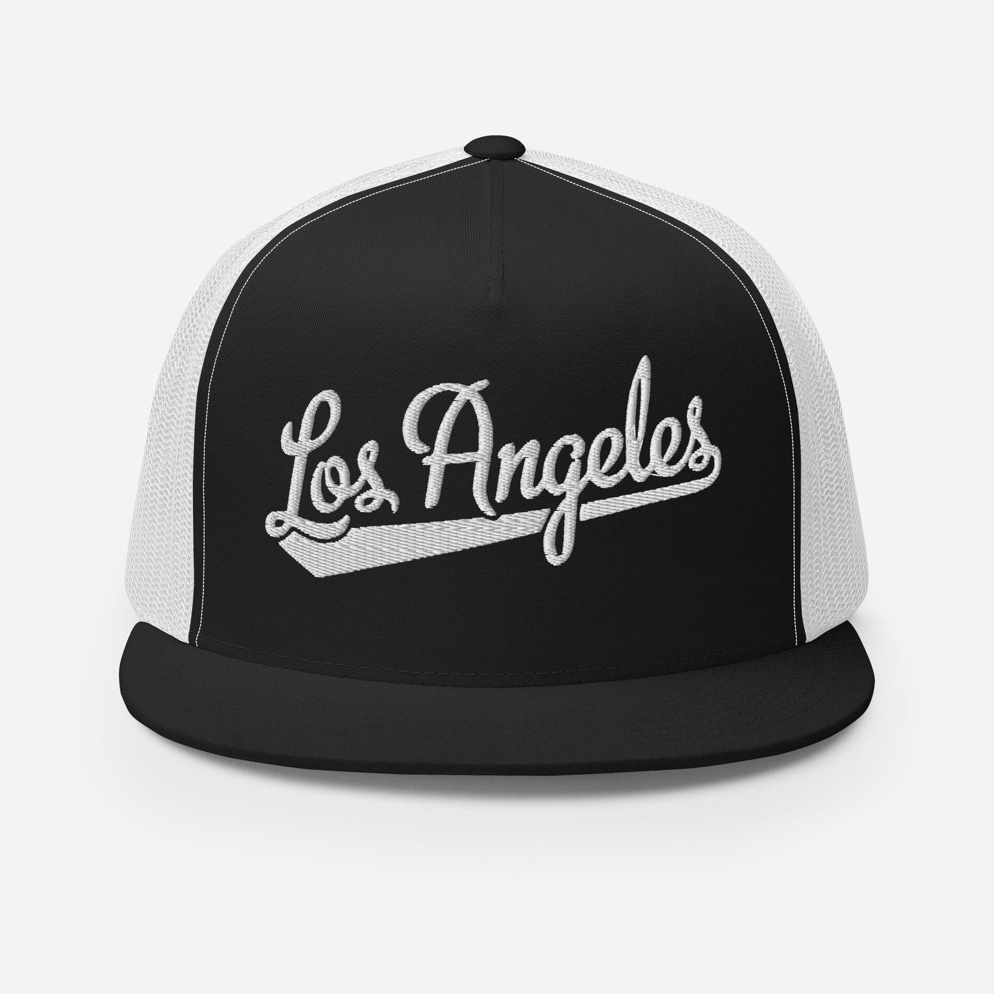 A black and white baseball cap with the text "Los Angeles" embroidered on it.