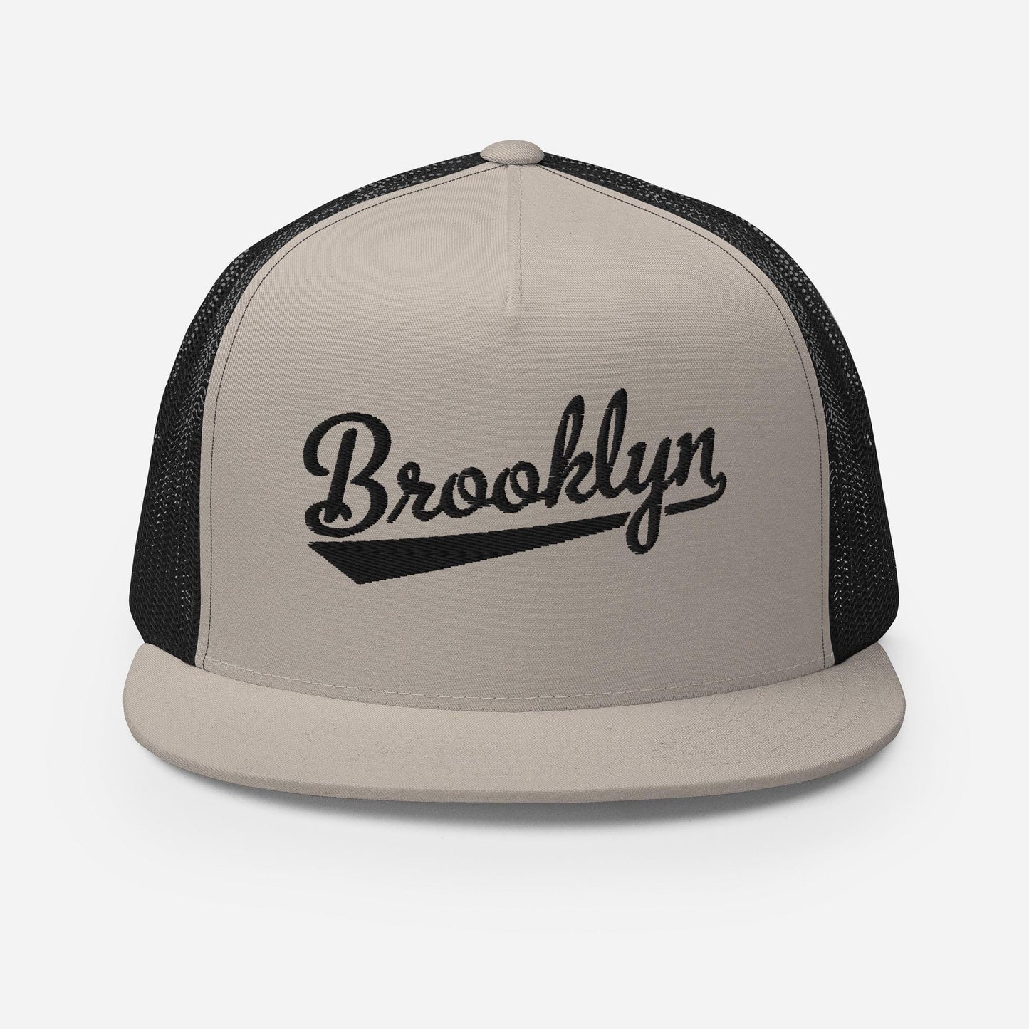 A black baseball cap with a mesh panel on the side.