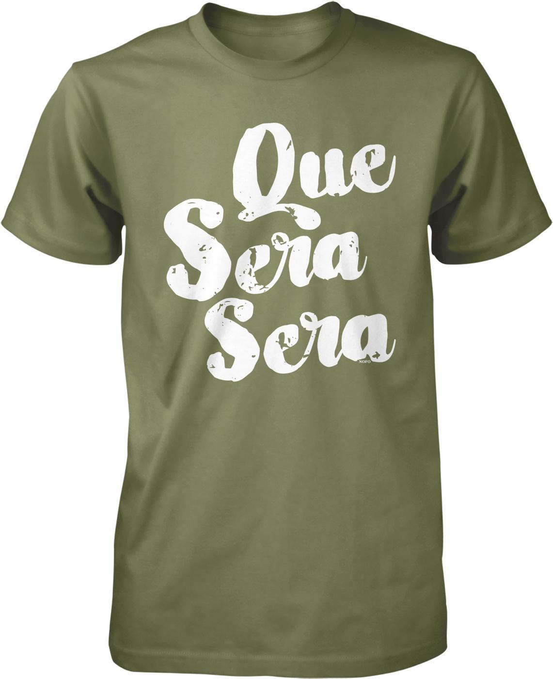 A green t-shirt with white text that says "Que sera sera" printed on it.