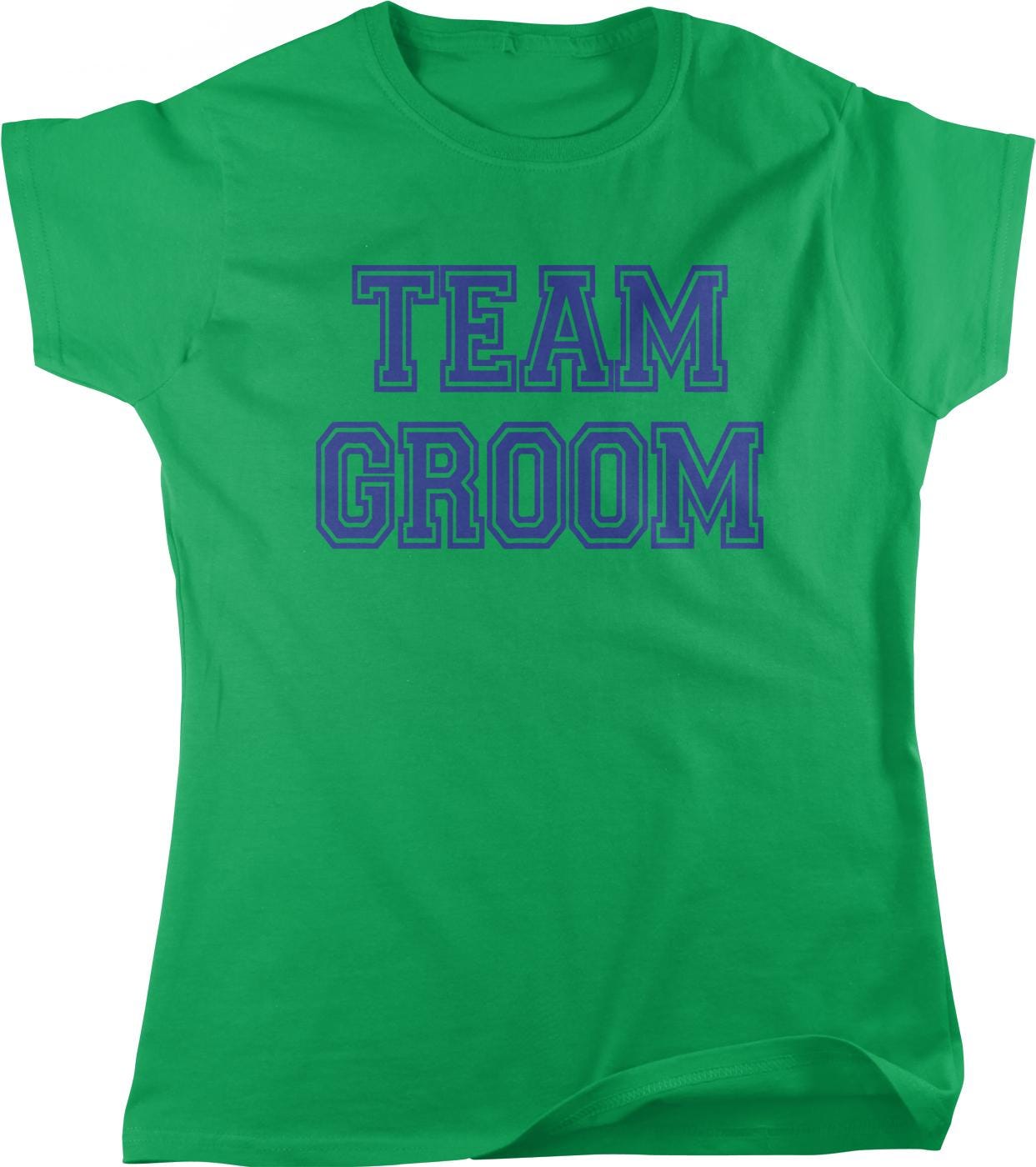A bright green t-shirt with the text "TEAM GROOM" printed on it in blue letters.