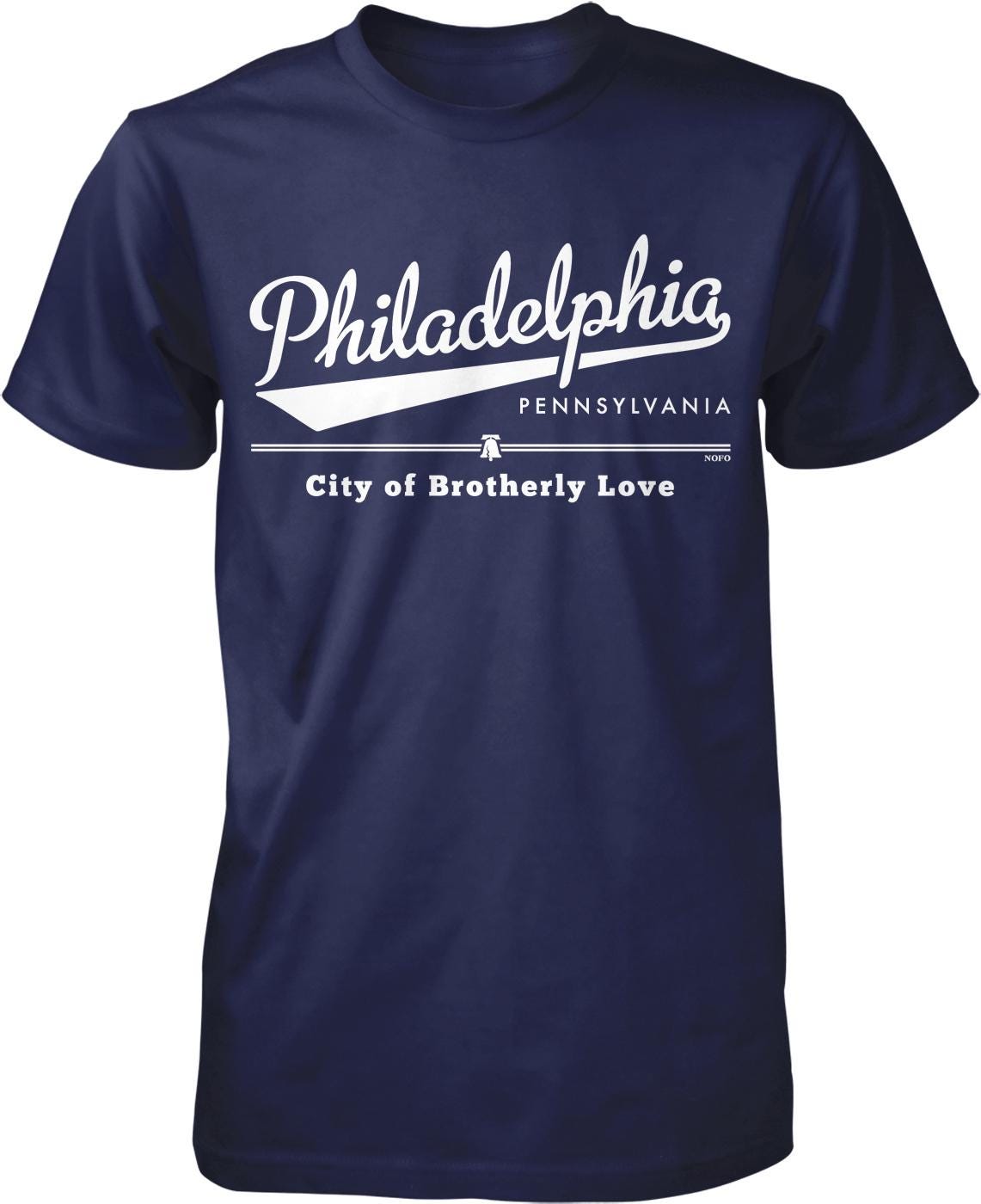 A navy blue t-shirt with white text and graphics that say "PhiladELPHIA, Pennsylvania City of Brotherly Love".