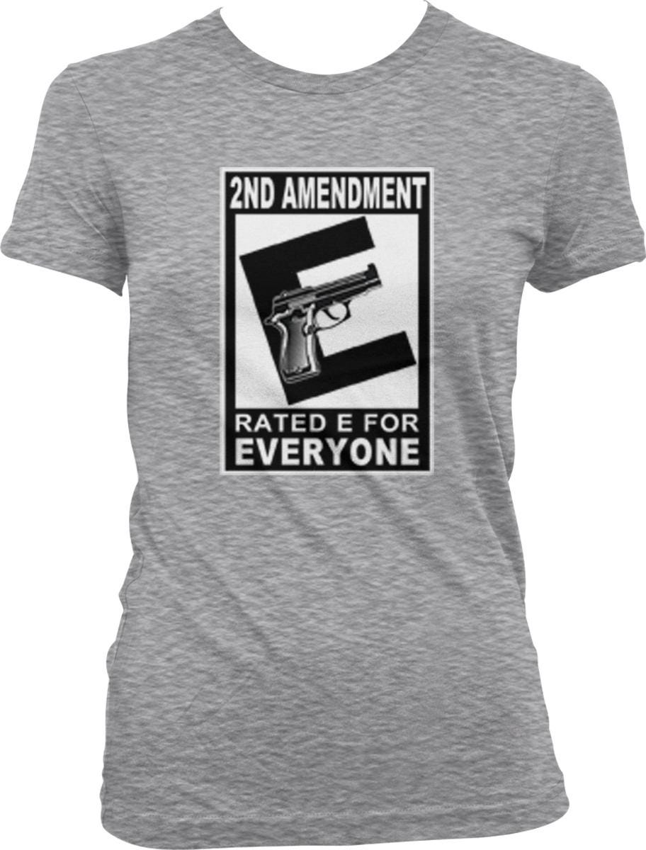 A gray t-shirt with a graphic design featuring a gun and the text "2ND AMENDMENT RATED E FOR EVERYONE".