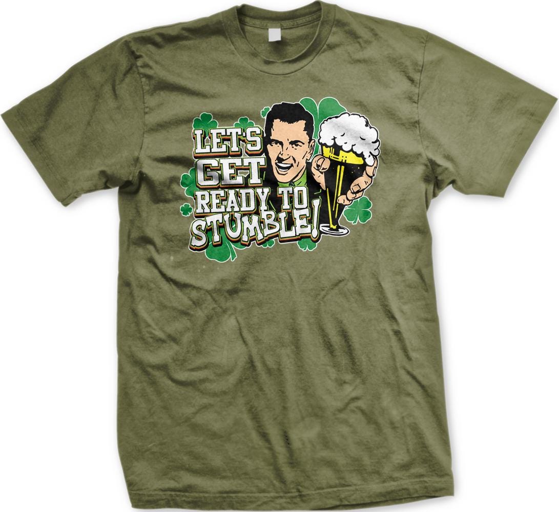 A t-shirt with a graphic design featuring a smiling man holding a beer mug and the text "Let's Get Ready to Stumble!"
