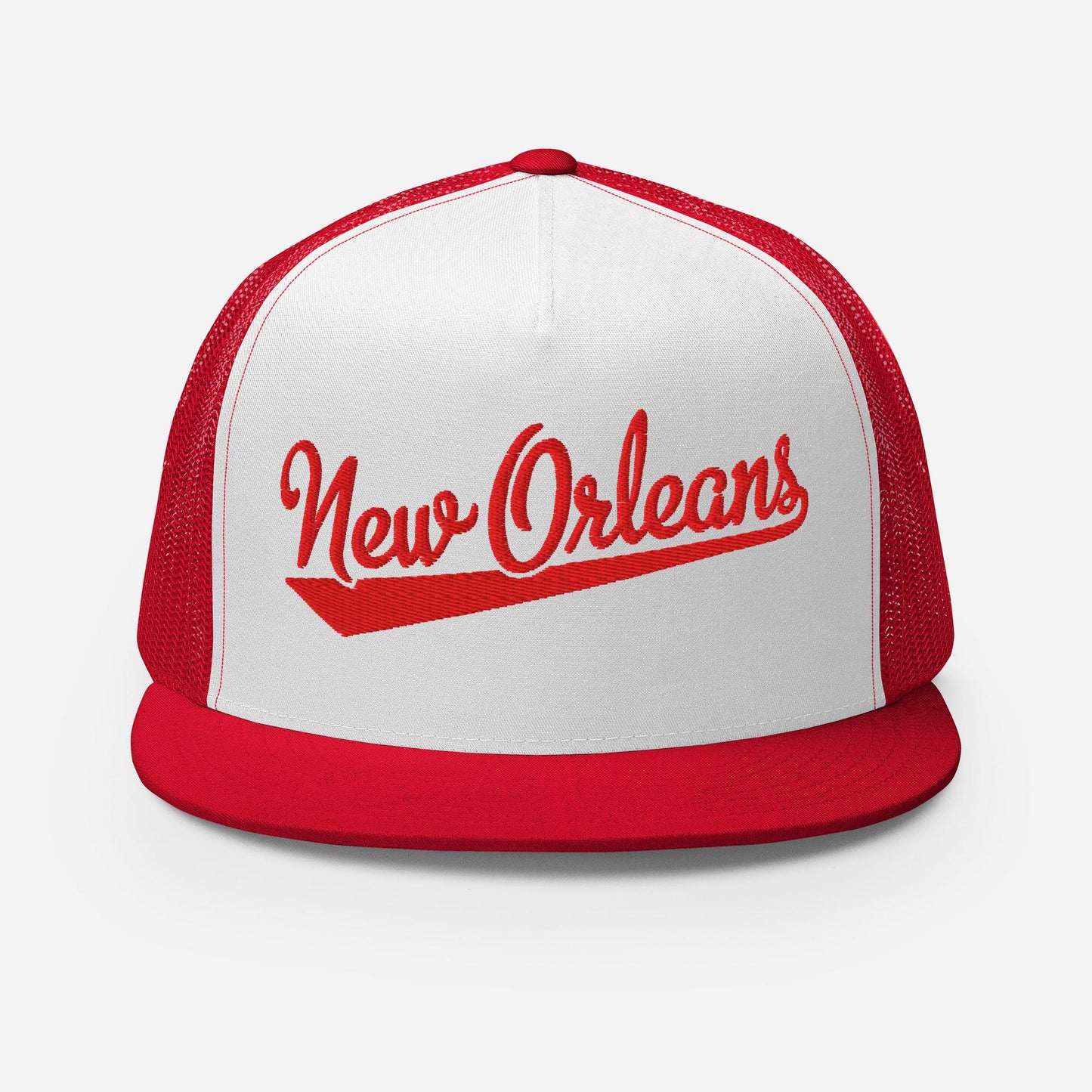 A red and white baseball cap with the text "New Orleans" printed on it.