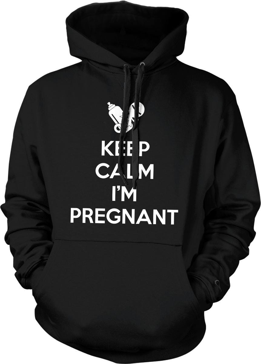 A black hoodie with white text that says &quot;KEEP CALM I&#39;M PREGNANT&quot;.