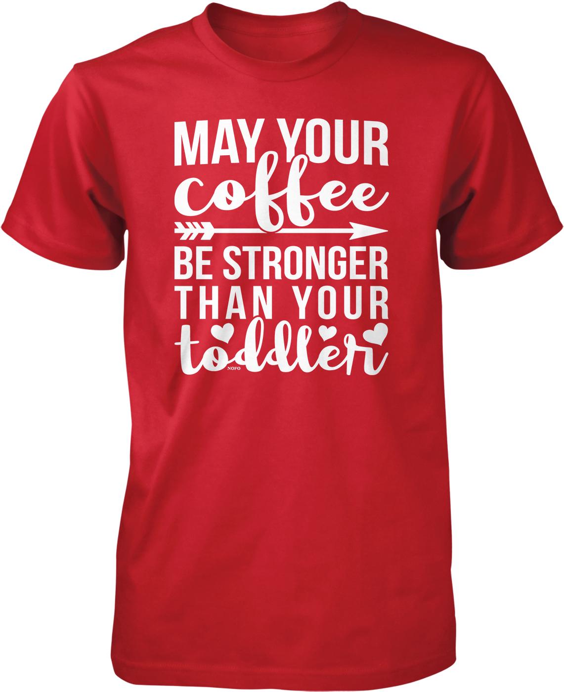 The image is a red t-shirt with white text that reads "May your coffee be stronger than your toddler".