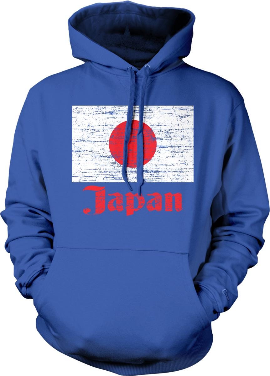 A blue hoodie with a graphic of the Japanese flag and the word "Japan" printed on it.