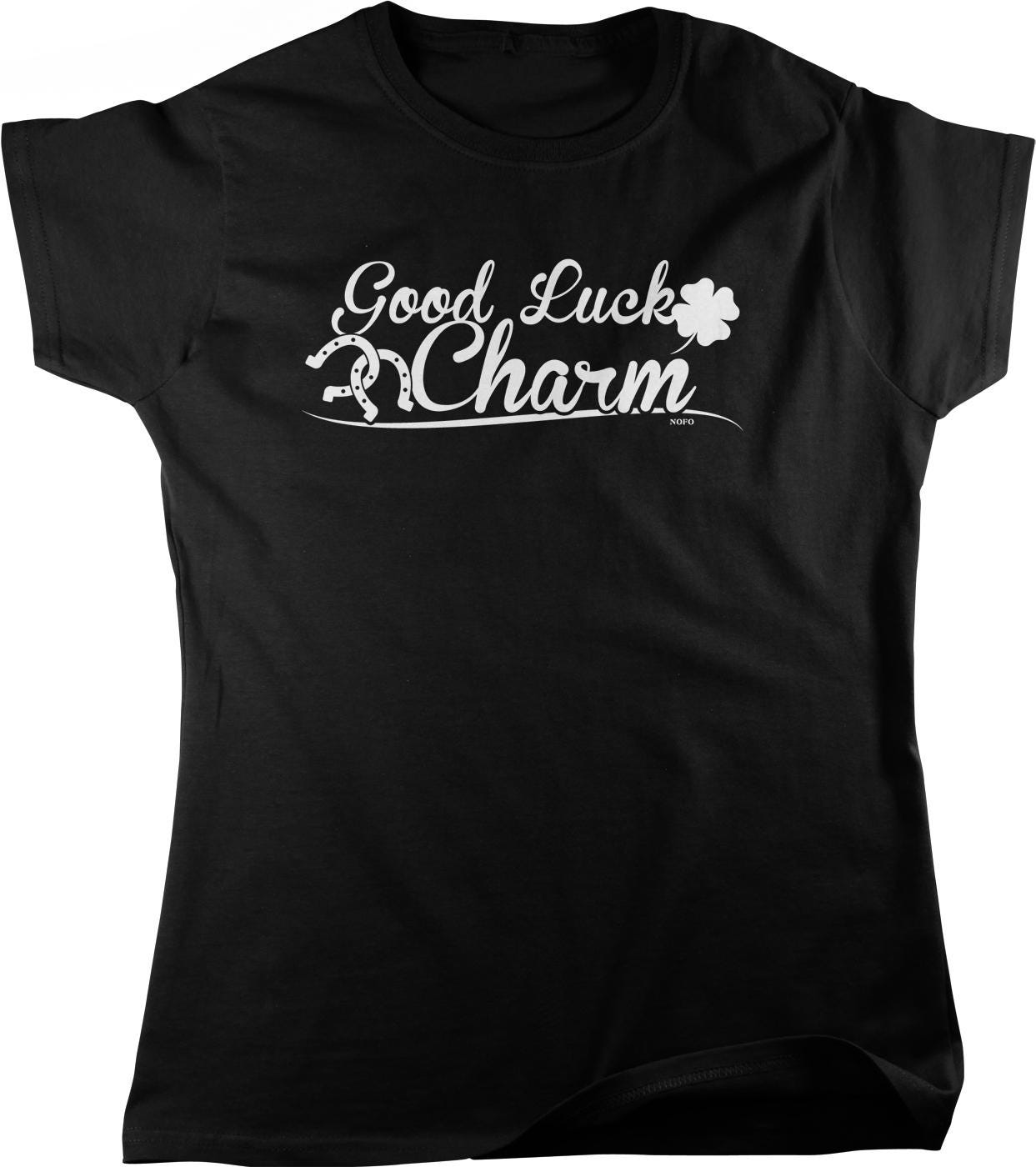 A black t-shirt with the text "Good Luck Charm" printed on it in white lettering.