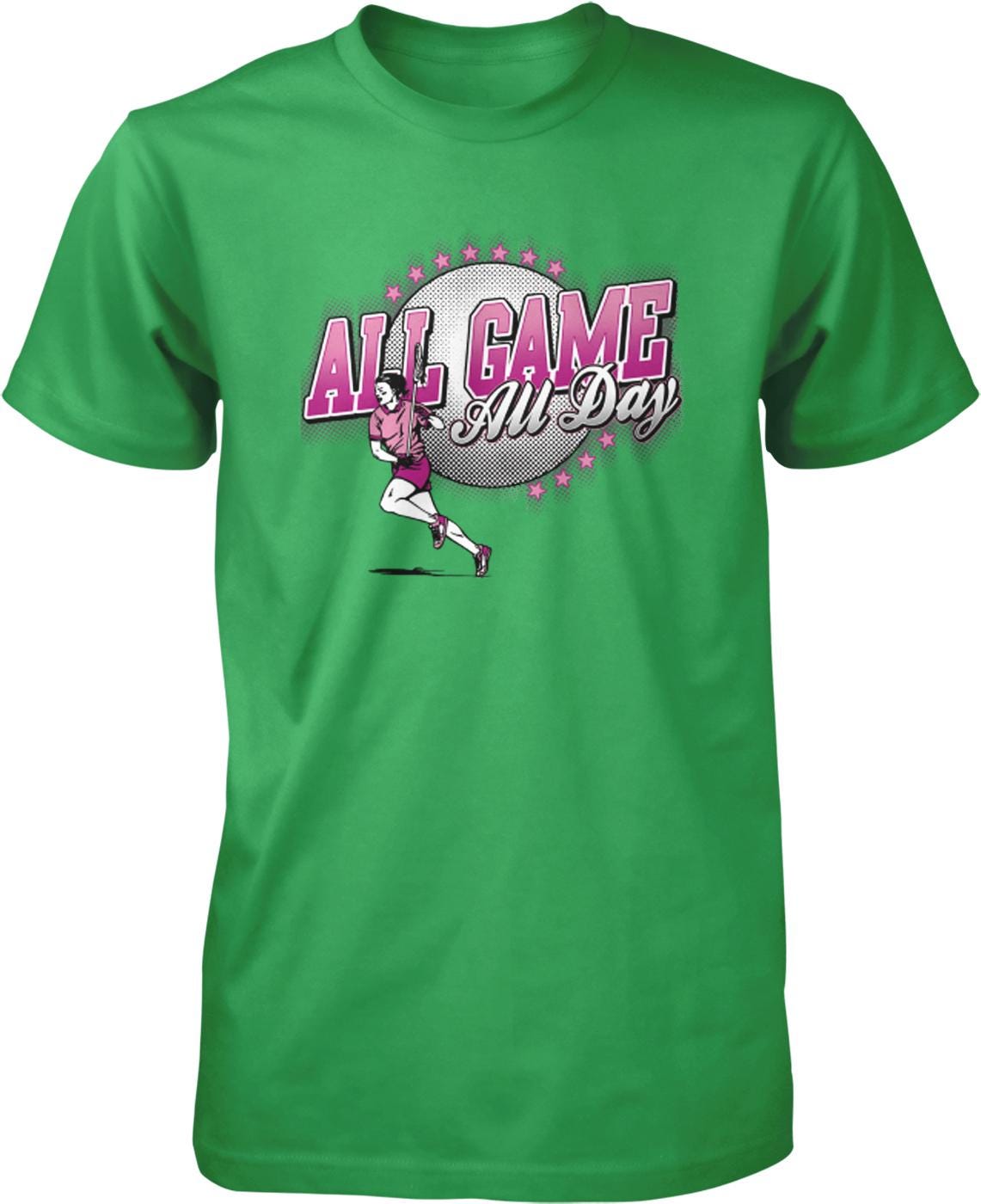 A green t-shirt with a graphic design featuring a woman running and the text "All Game All Day" in pink and white colors.
