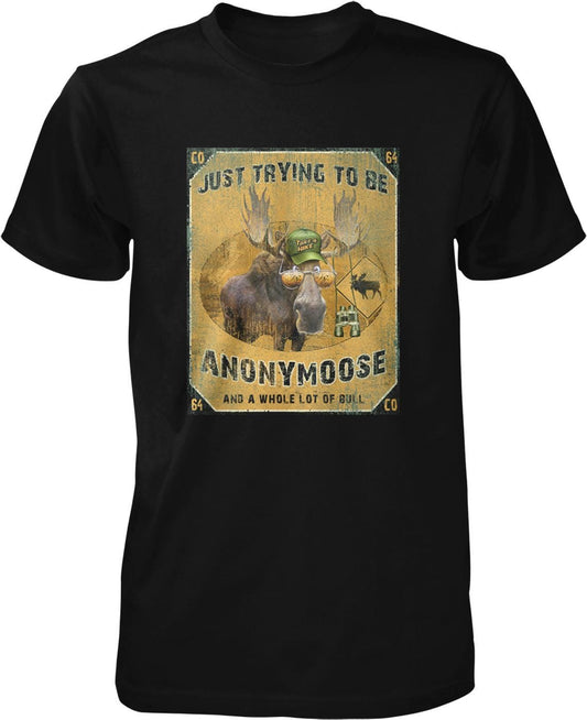 A black t-shirt with a graphic design featuring a moose wearing a green hat and the text "Just trying to be ANONYMOOSE AND A WHOLE LOT OF BULL" printed on it.
