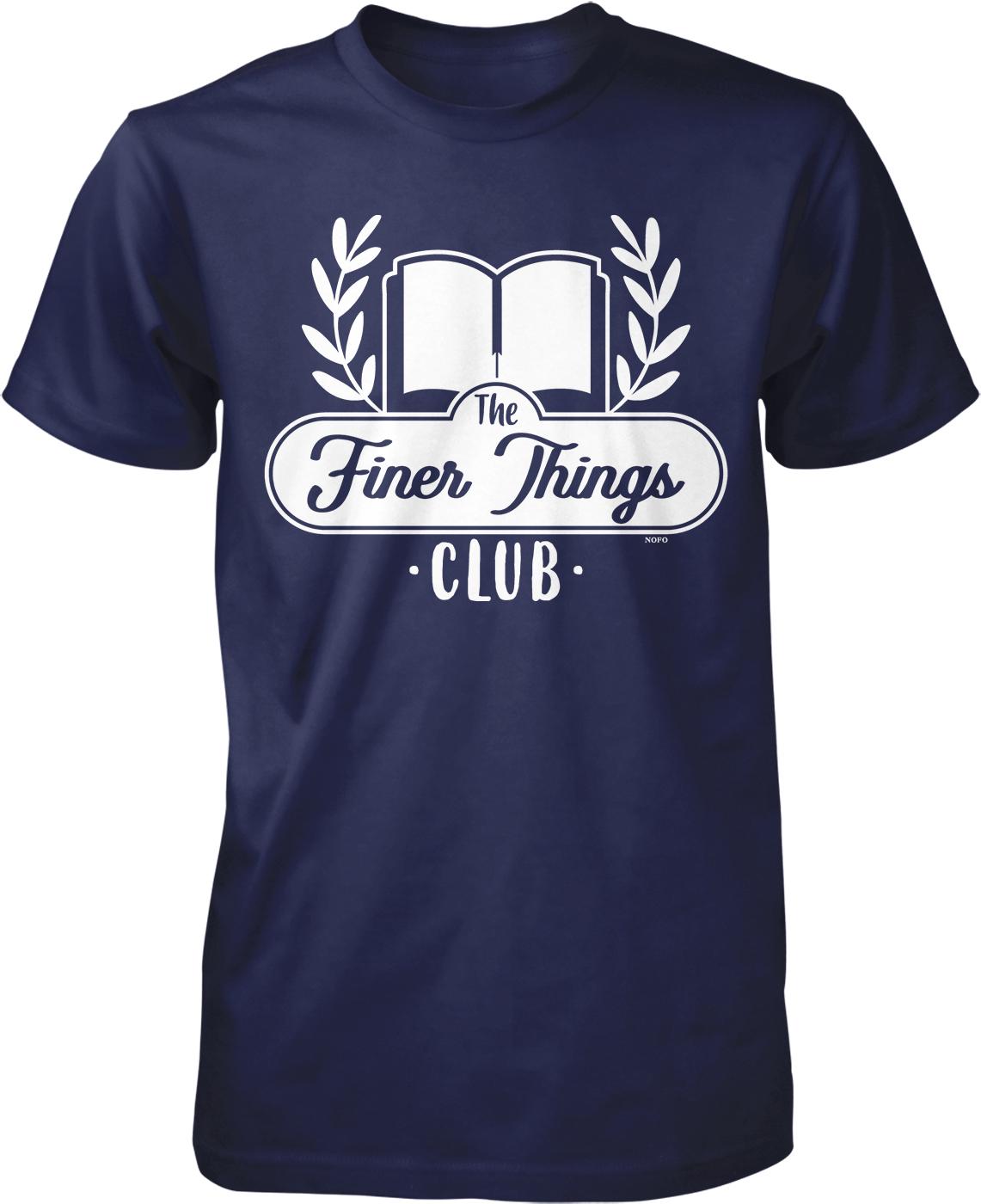 A navy blue t-shirt with a white graphic design featuring a book and laurel wreath, along with the text "The Finer Things Club" printed on it.