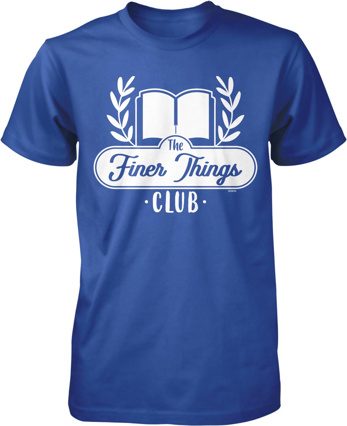 A blue t-shirt with a white graphic design featuring a book and laurel wreath, along with the text "The Finer Things Club" printed on it.
