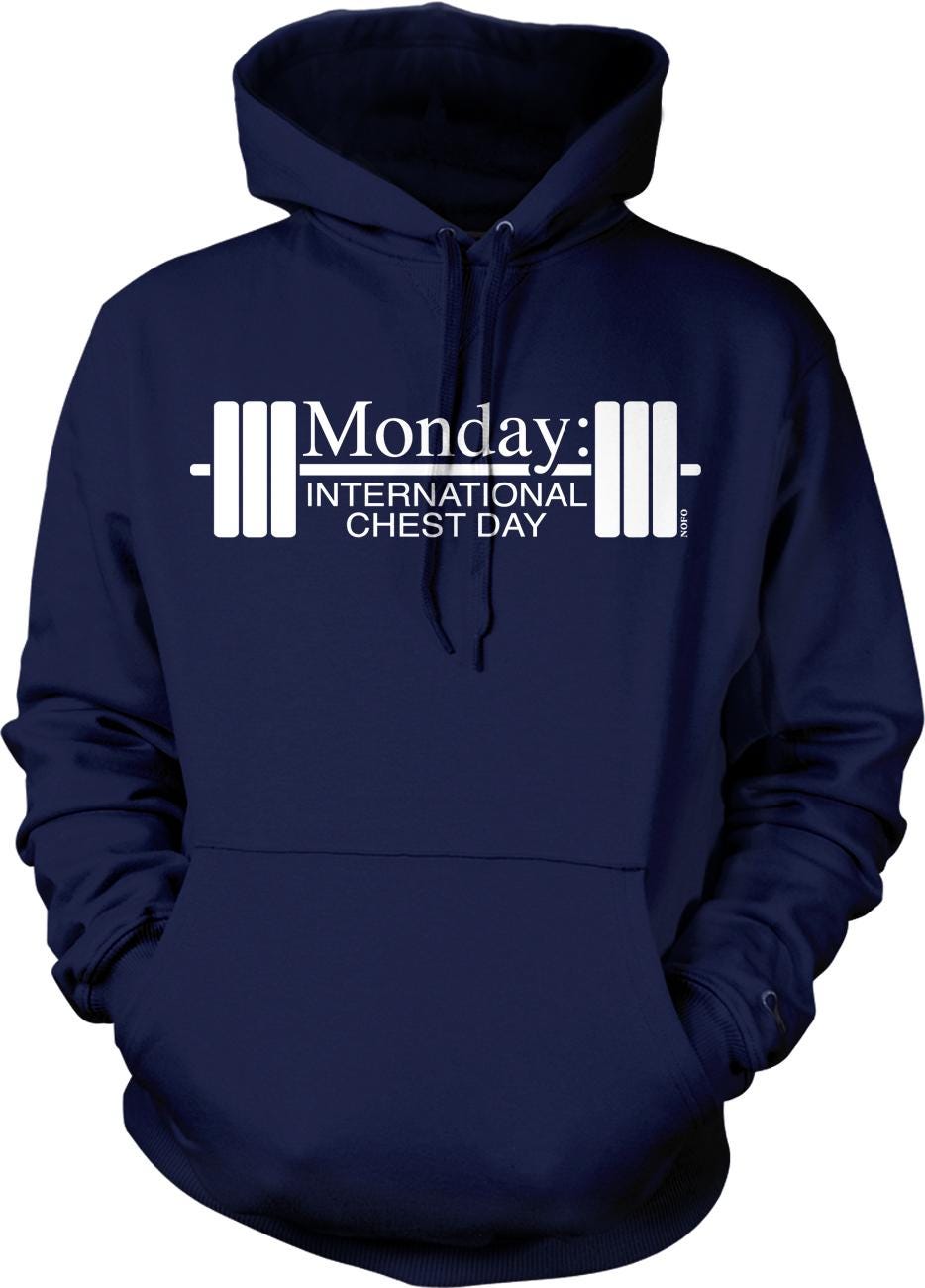 A navy blue hoodie with the text "Monday: International Chest Day" printed on it.