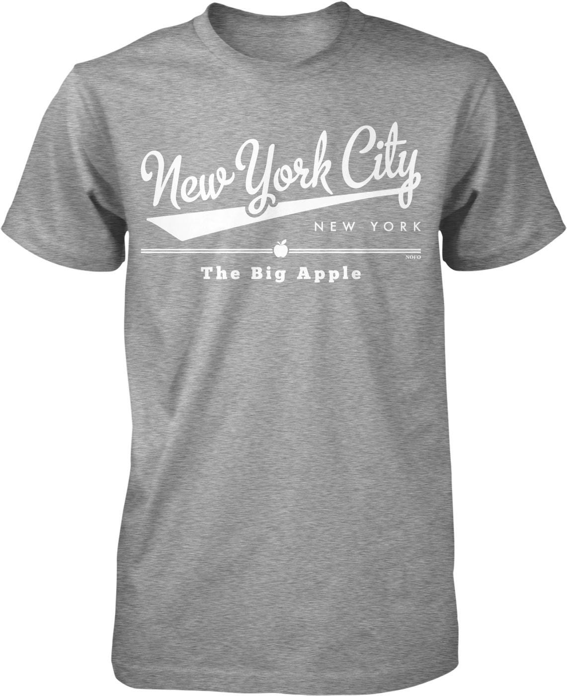 A gray t-shirt with white text and graphics that say "New York City" and "The Big Apple".