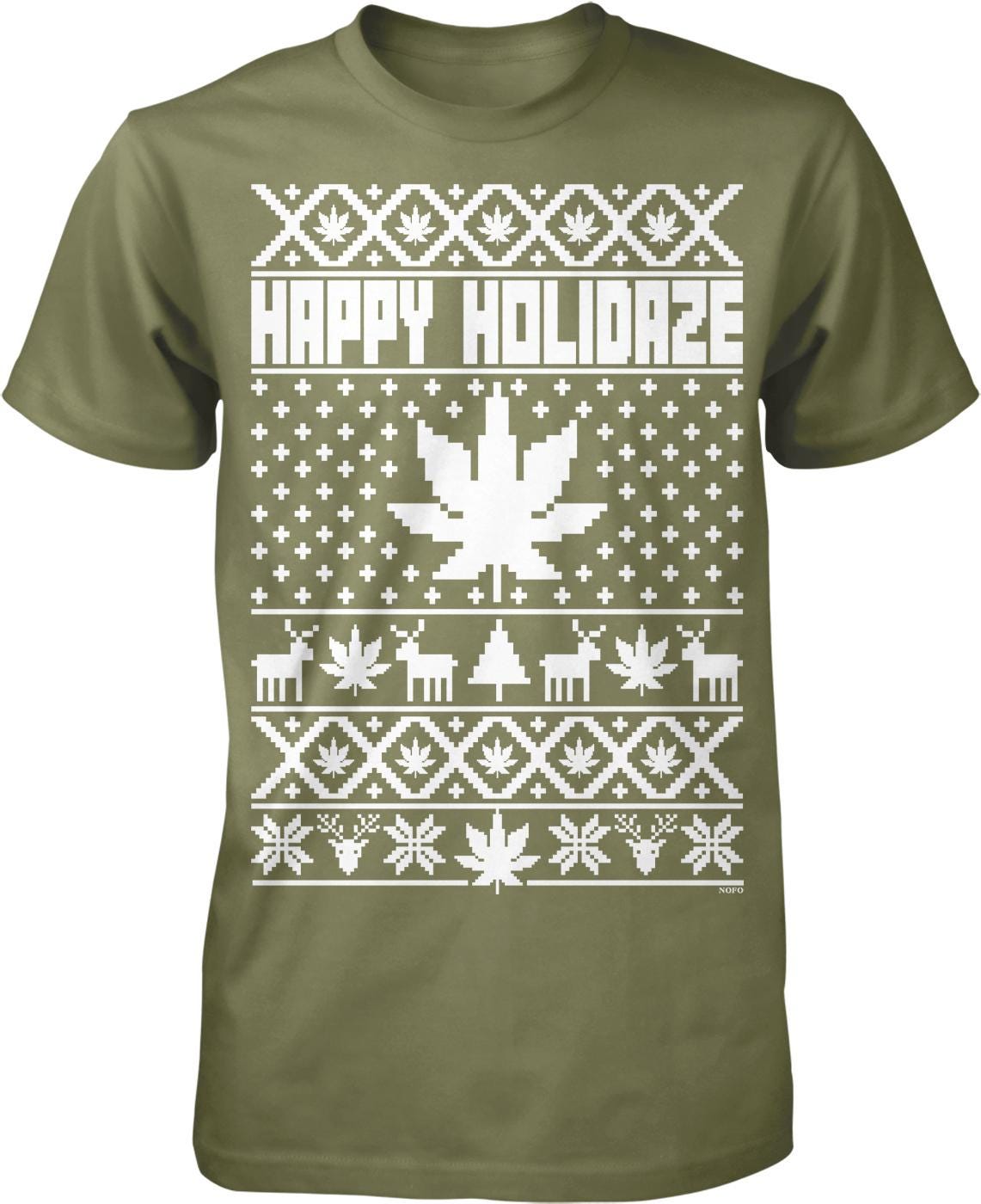 A t-shirt with a graphic design featuring a Christmas tree, snowflakes, and various other winter-themed elements. The text "HAPPY HOLIDAZE" is prominently displayed across the design.