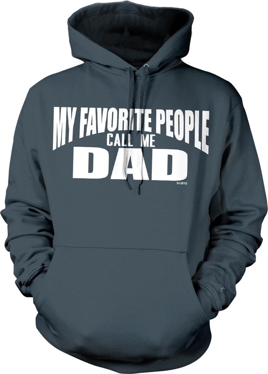 A gray hoodie with white text that says "MY FAVORITE PEOPLE CALL ME DAD" printed on it.