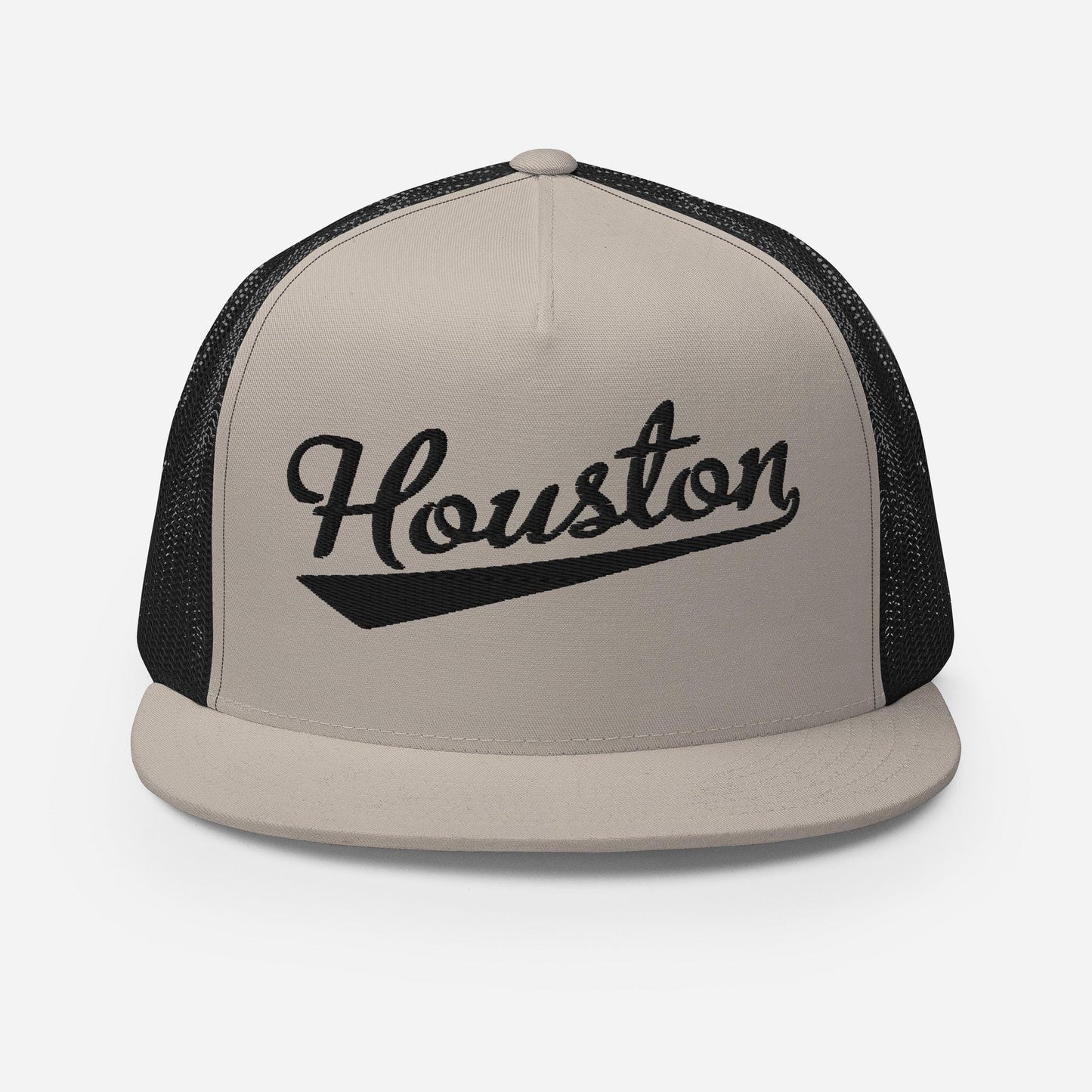 A beige baseball cap with the word "Houston" printed on it in black text.