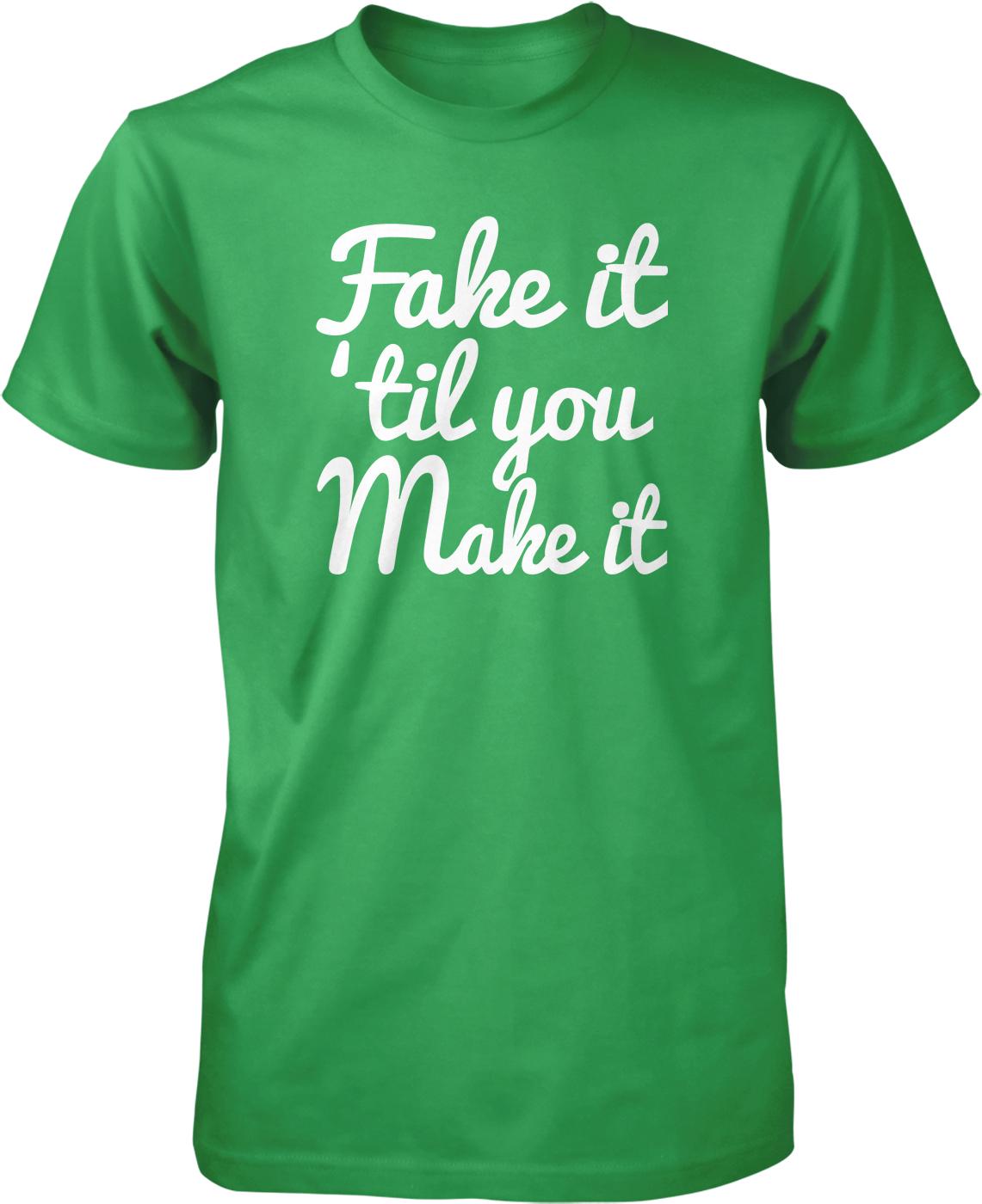 A green t-shirt with white text that reads "Fake it 'til you Make it".