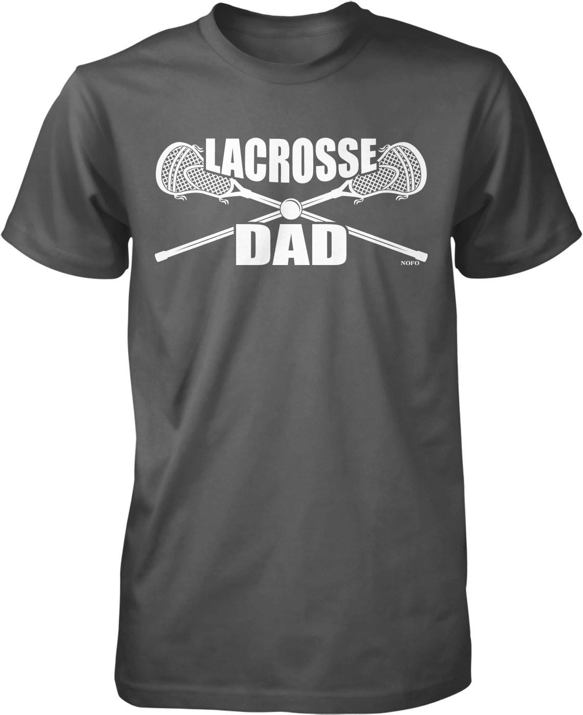 A gray t-shirt with the text "LACROSSE DAD" printed on it, along with a graphic of a lacrosse stick crossed over a lacrosse net.