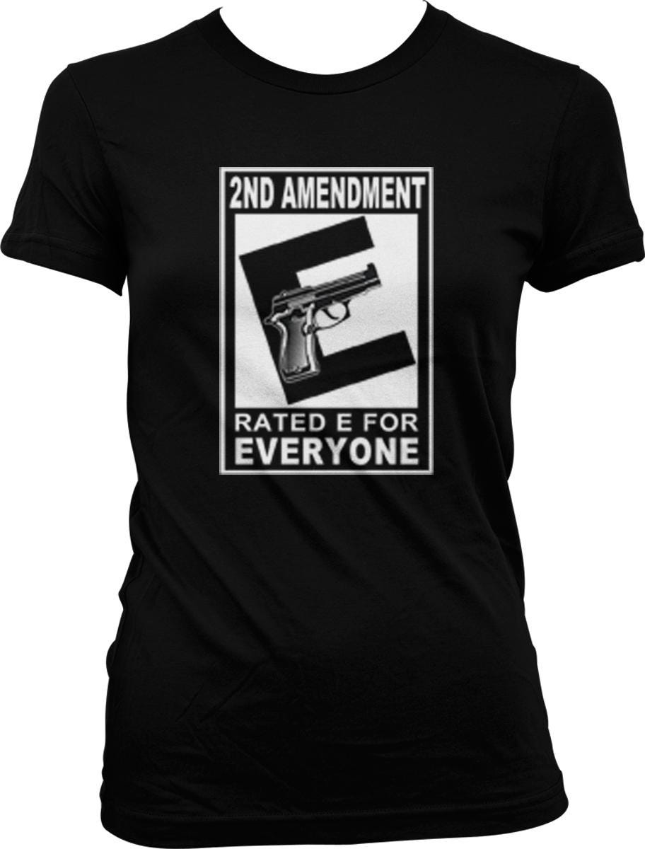 A black t-shirt with a graphic design featuring a gun and the text "2ND AMENDMENT RATED E FOR EVERYONE".