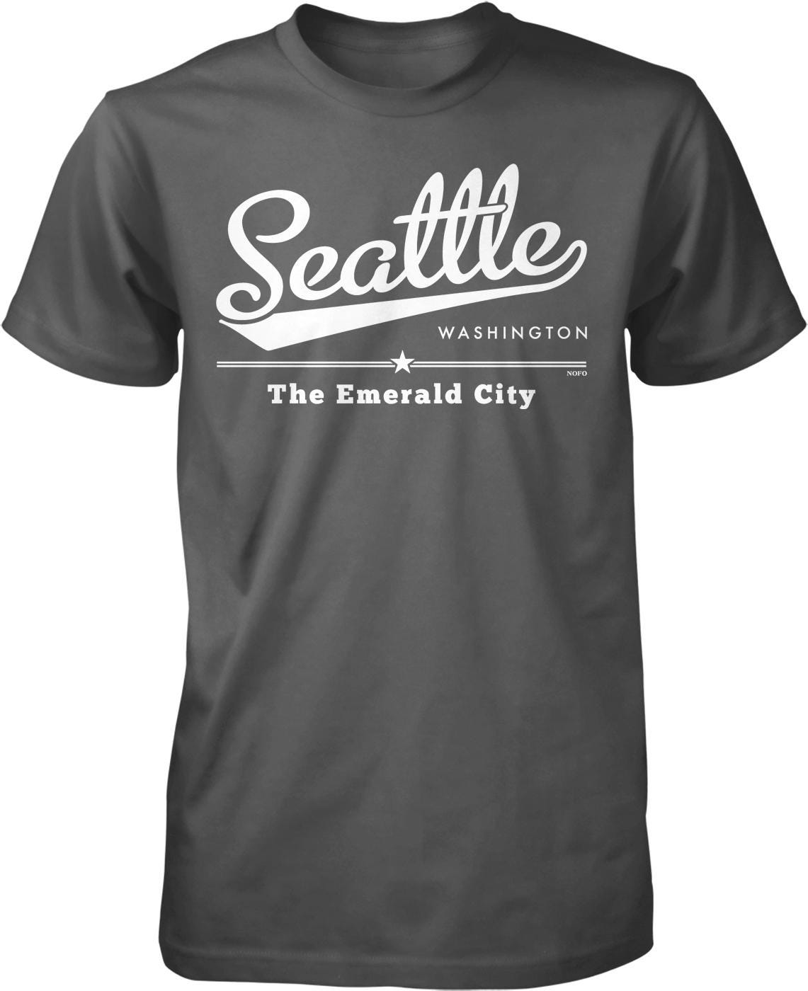 A gray t-shirt with white text and graphics that say "Seattle Washington The Emerald City".