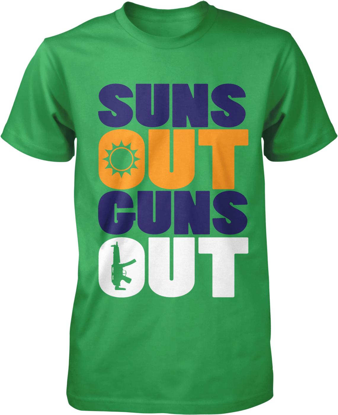 A green t-shirt with the text "SUNS OUT GUNS OUT" printed on it.