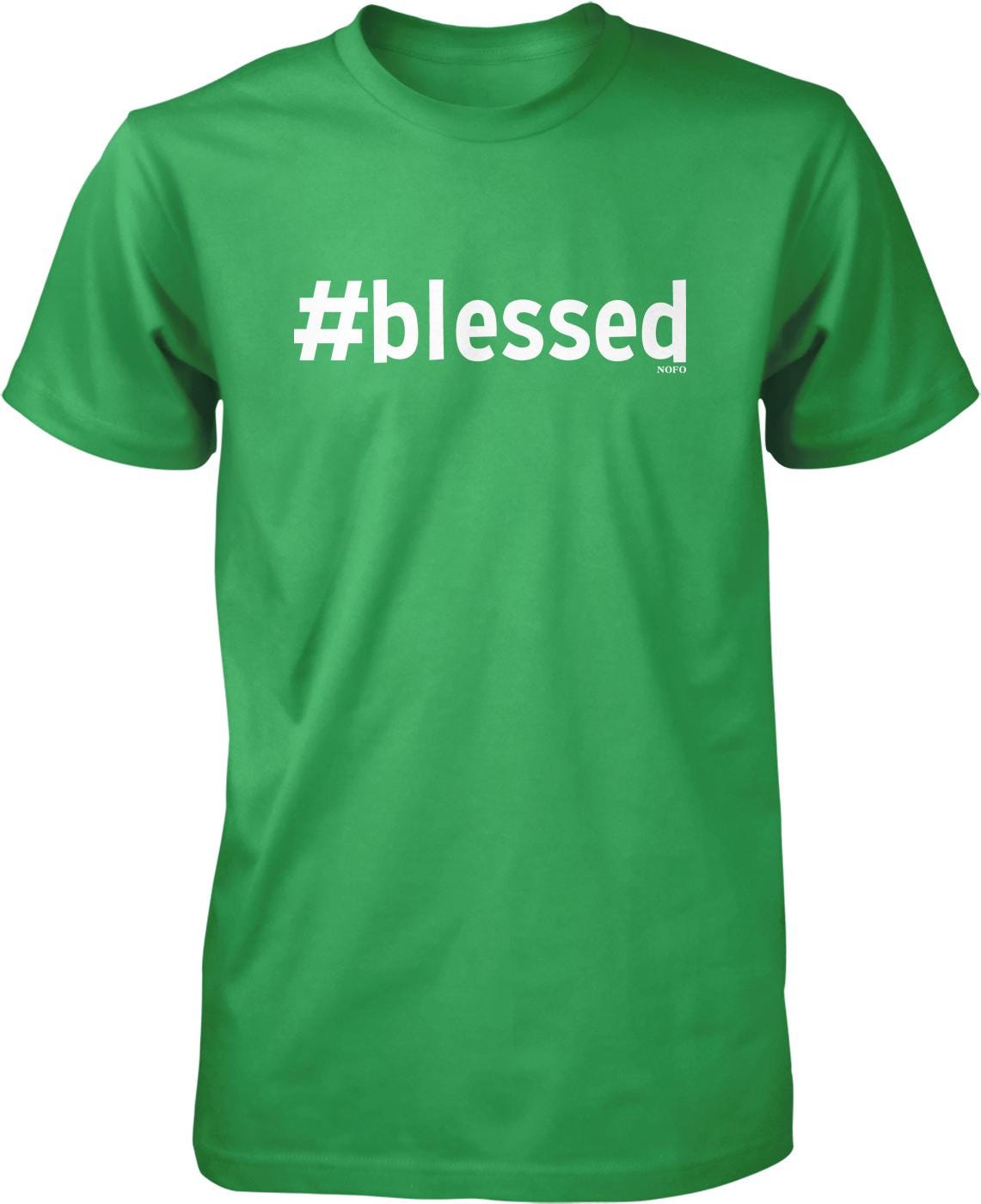 A green t-shirt with the text "#blessed" printed on it.