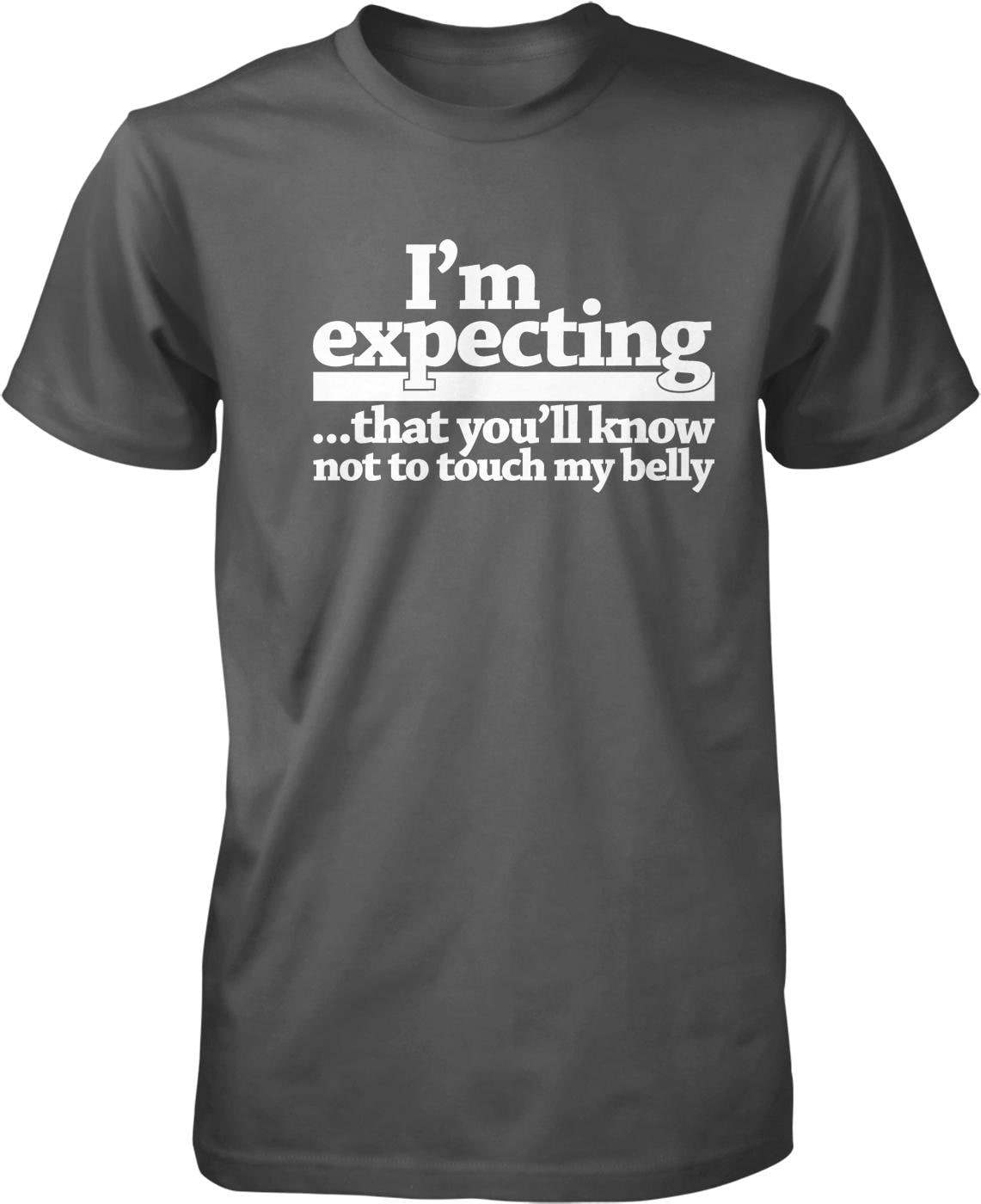 A gray t-shirt with white text that reads "I'm expecting... that you'll know not to touch my belly".