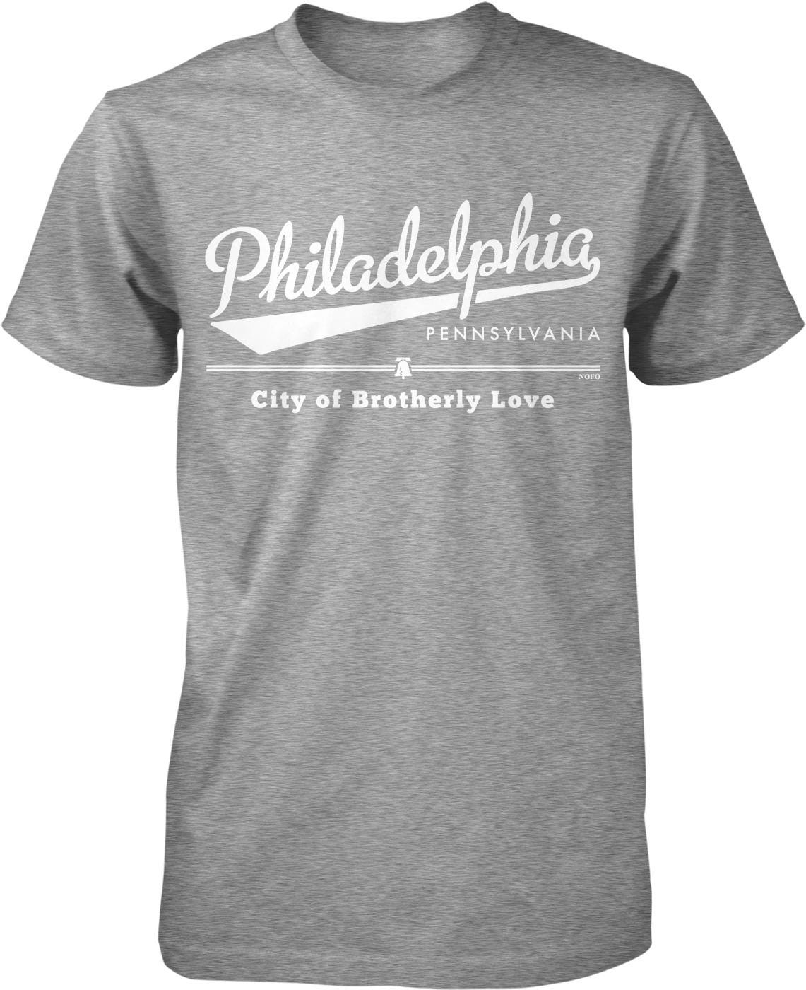 A gray t-shirt with white text and graphics printed on it.