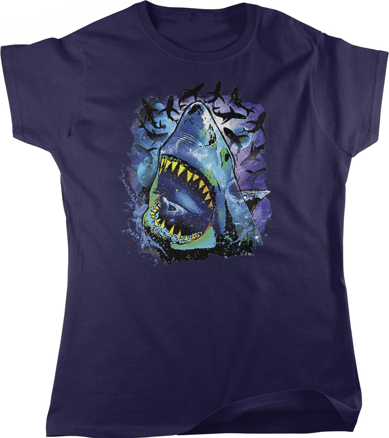 A t-shirt with a graphic design depicting a large shark with its mouth open, surrounded by a flock of birds.
