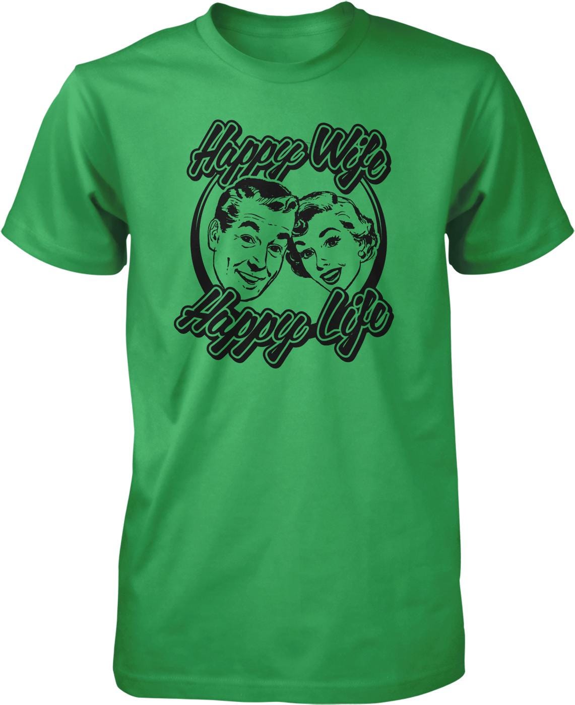 A green t-shirt with a graphic design featuring two smiling faces, along with the text "Happy Wifes Happy Life" written above and below the faces.