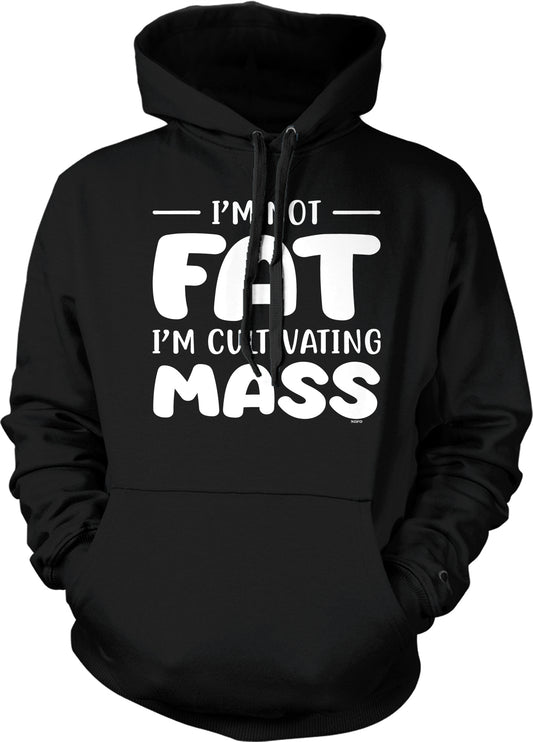 A black hoodie with white text that reads "I'M NOT FAT I'M CULT VATING MASS".