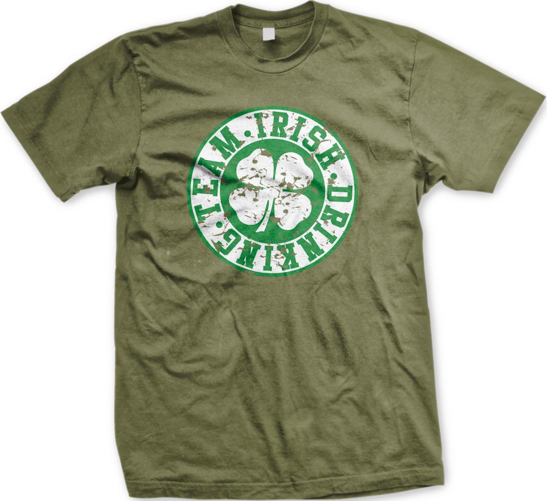 A green t-shirt with a circular graphic design featuring a white clover and the text "TEAM. IRISH. DRINK. DANCE."