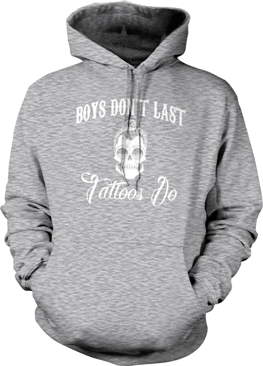 A grey hoodie with the text "BOYS DON'T LAST Tattoos Do" printed on it.
