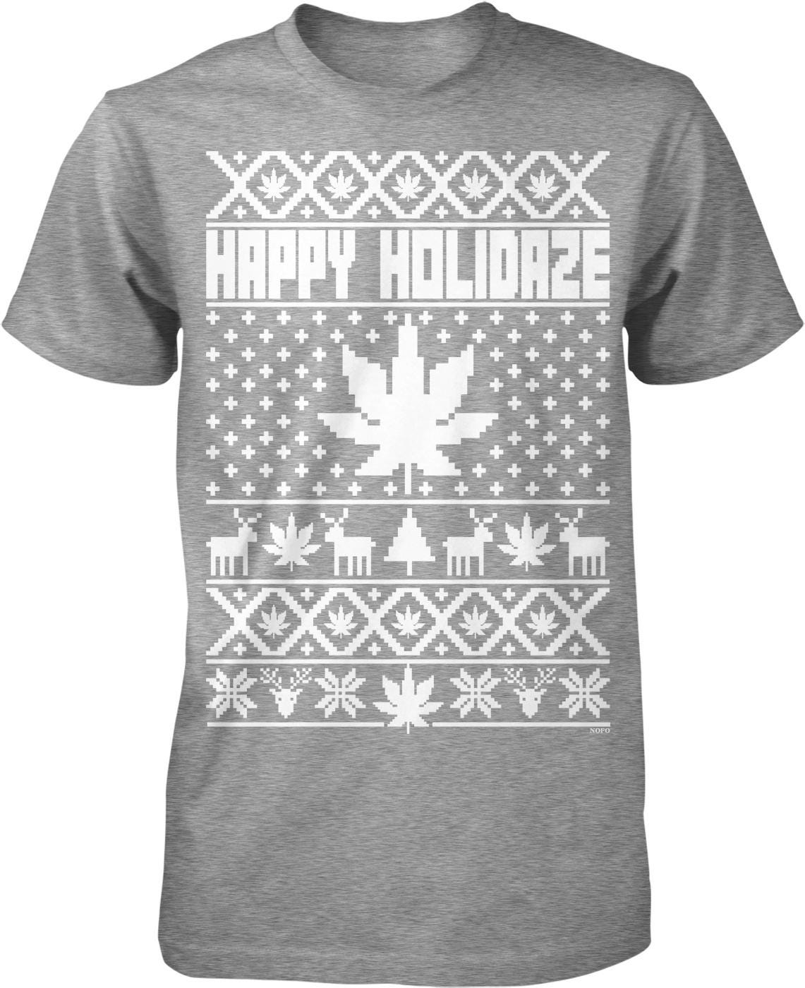 A gray t-shirt with a repeating pattern of snowflakes, pine trees, and deer, along with the text "Happy Holidaze" in the center.