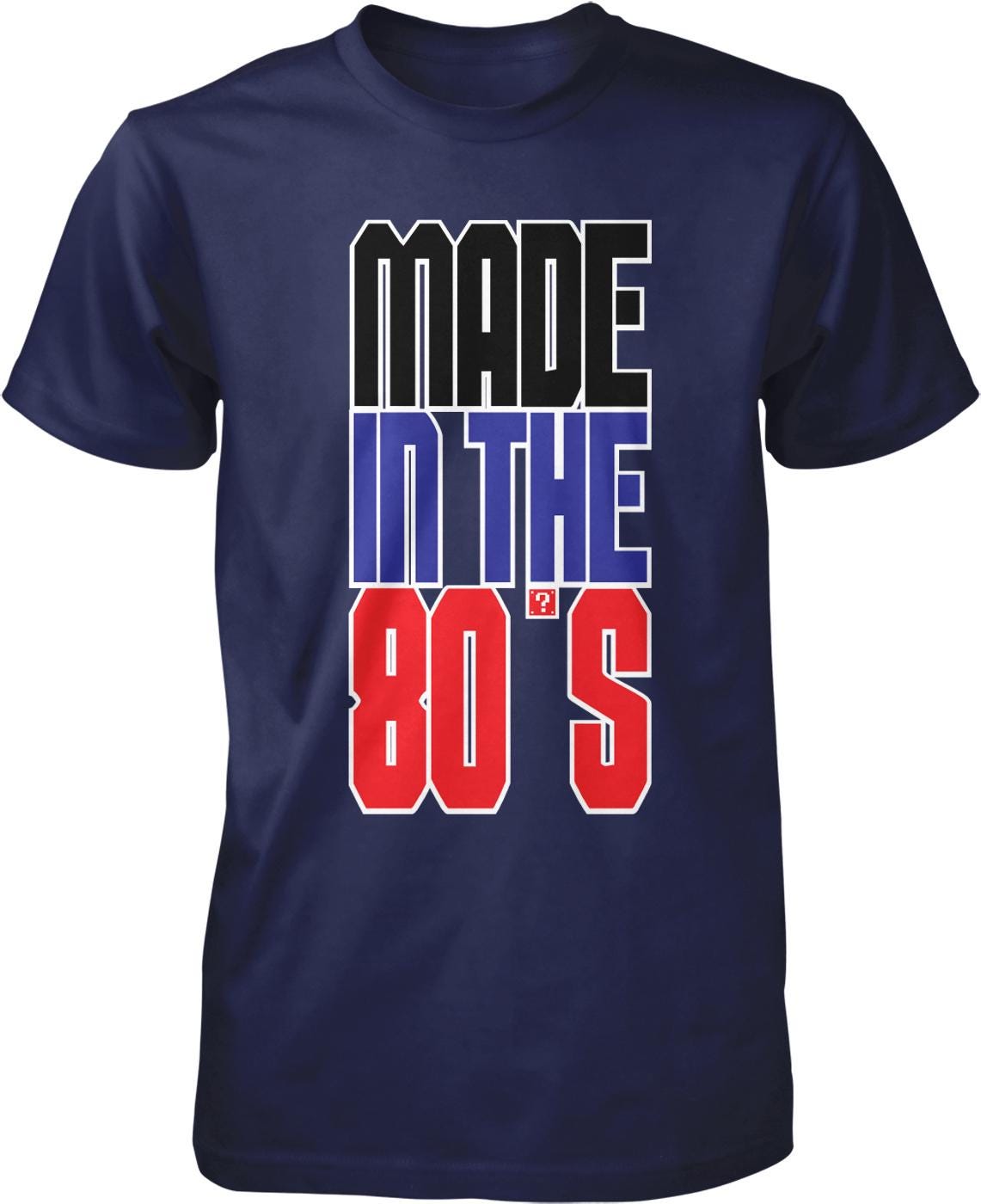 A navy blue t-shirt with the text "MADE IN THE 80'S" printed on it in a bold, stylized font.