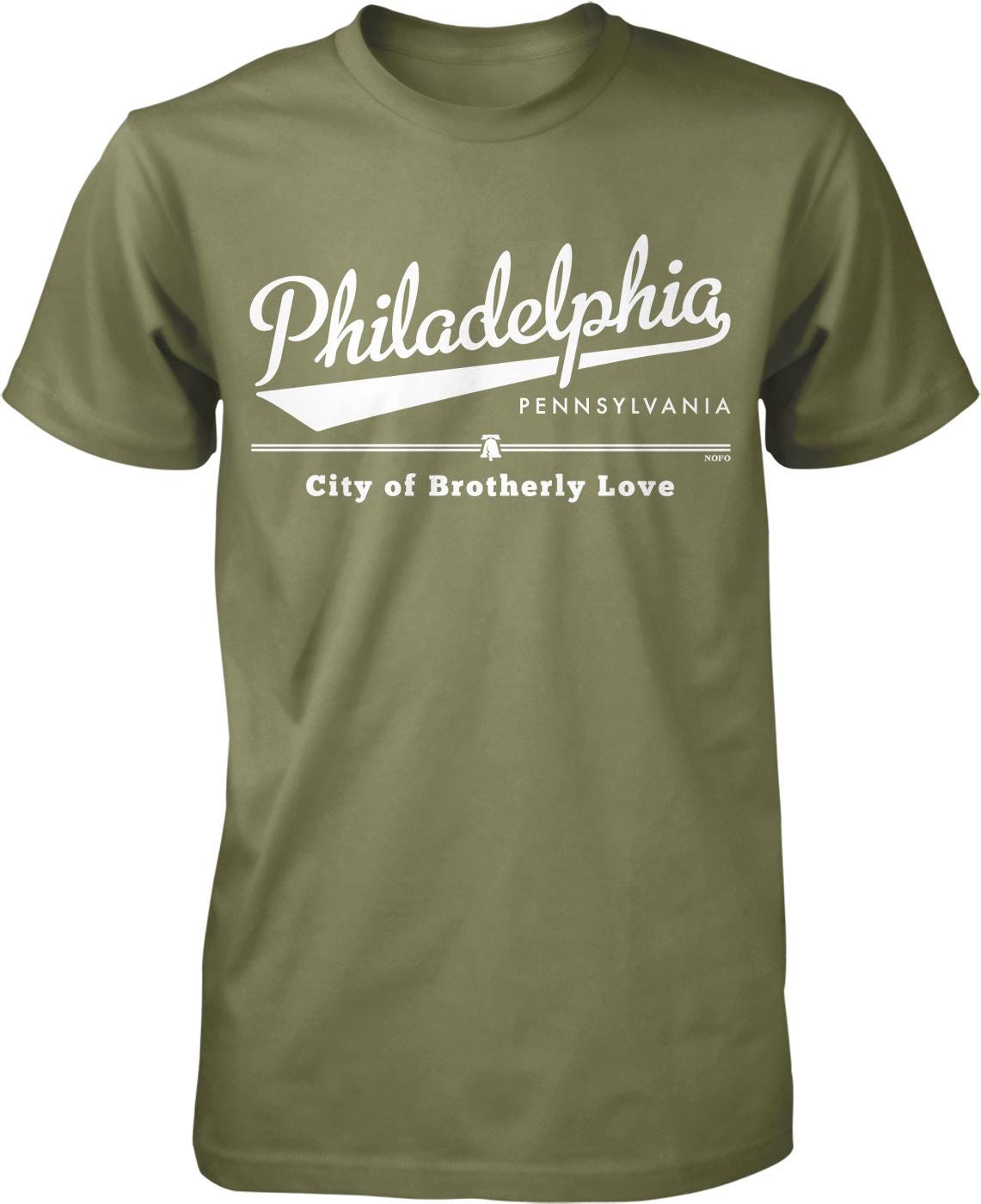 A green t-shirt with white text that says "PhiladELPHIA, PA" and "City of Brotherly Love" printed on it.